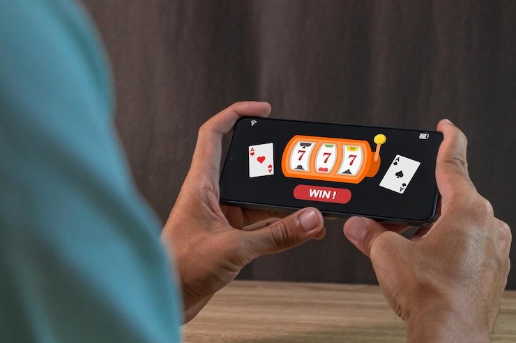 Antarmuka platform pbowin menampilkan taruhan olahraga dan meja kasino langsung di perangkat mobile